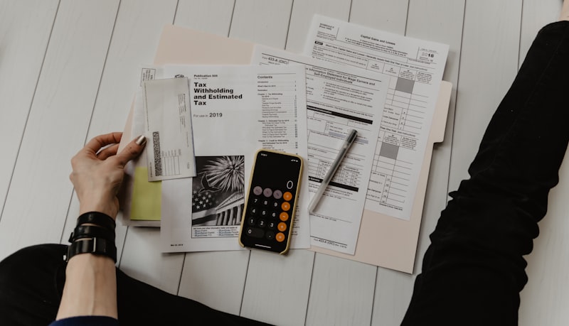 Calculator and notebook on a desk